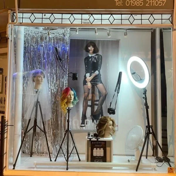 Window Dressing hair salon window