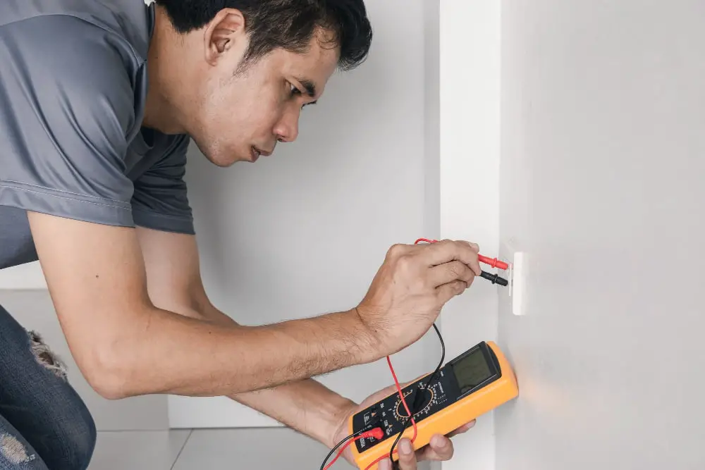 electrician inspecting home