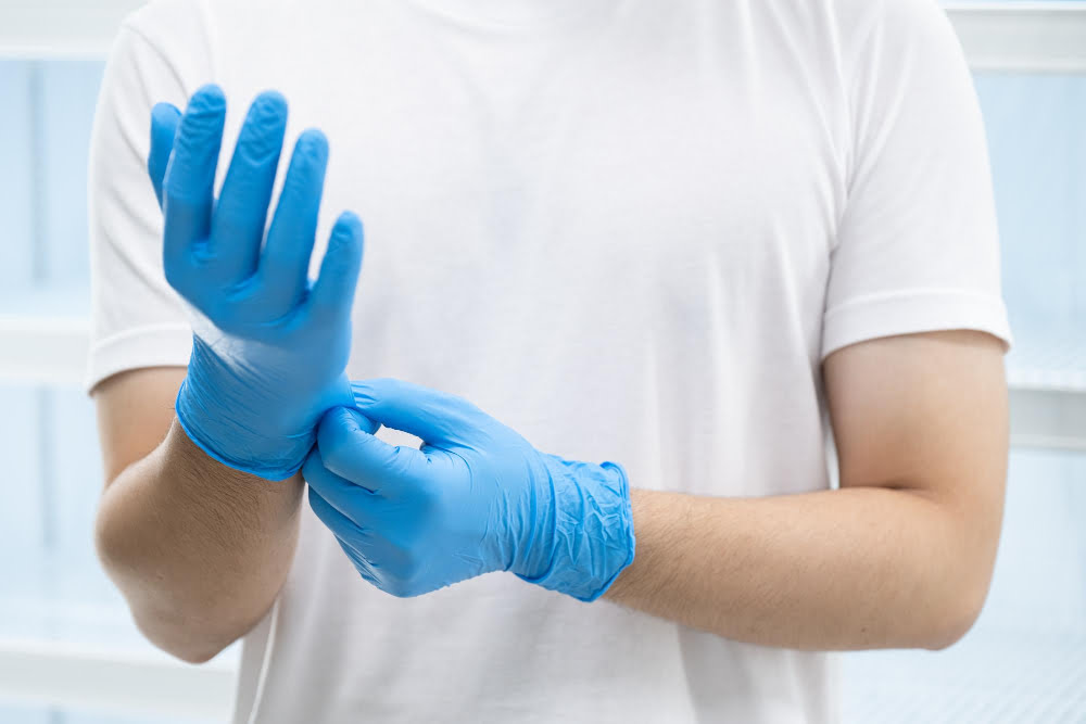 man wearing gloves