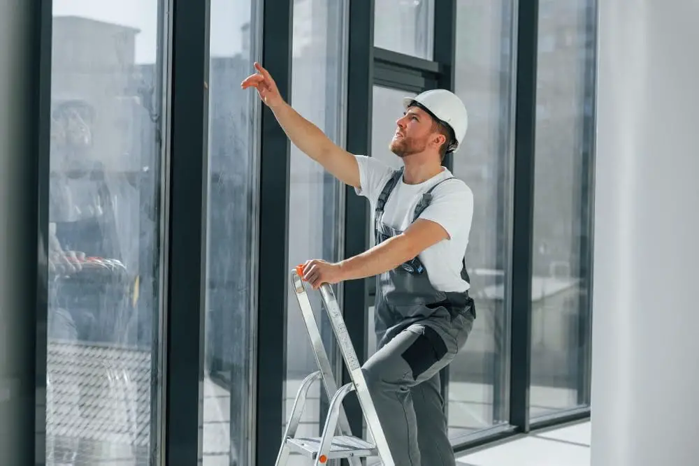 window repair with ladder