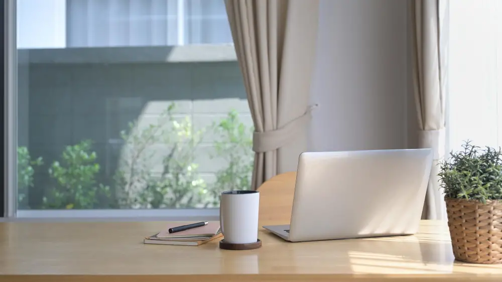 Should Your Desk Be Placed In Front Of A Window?