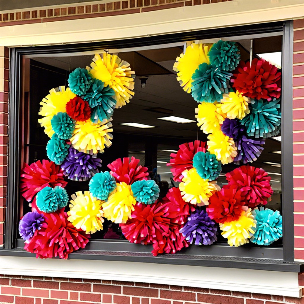 hang pom poms in varying sizes and team colors across the window